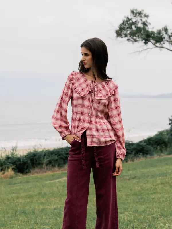 Pink plaid mock neck blouse sold by Silbon