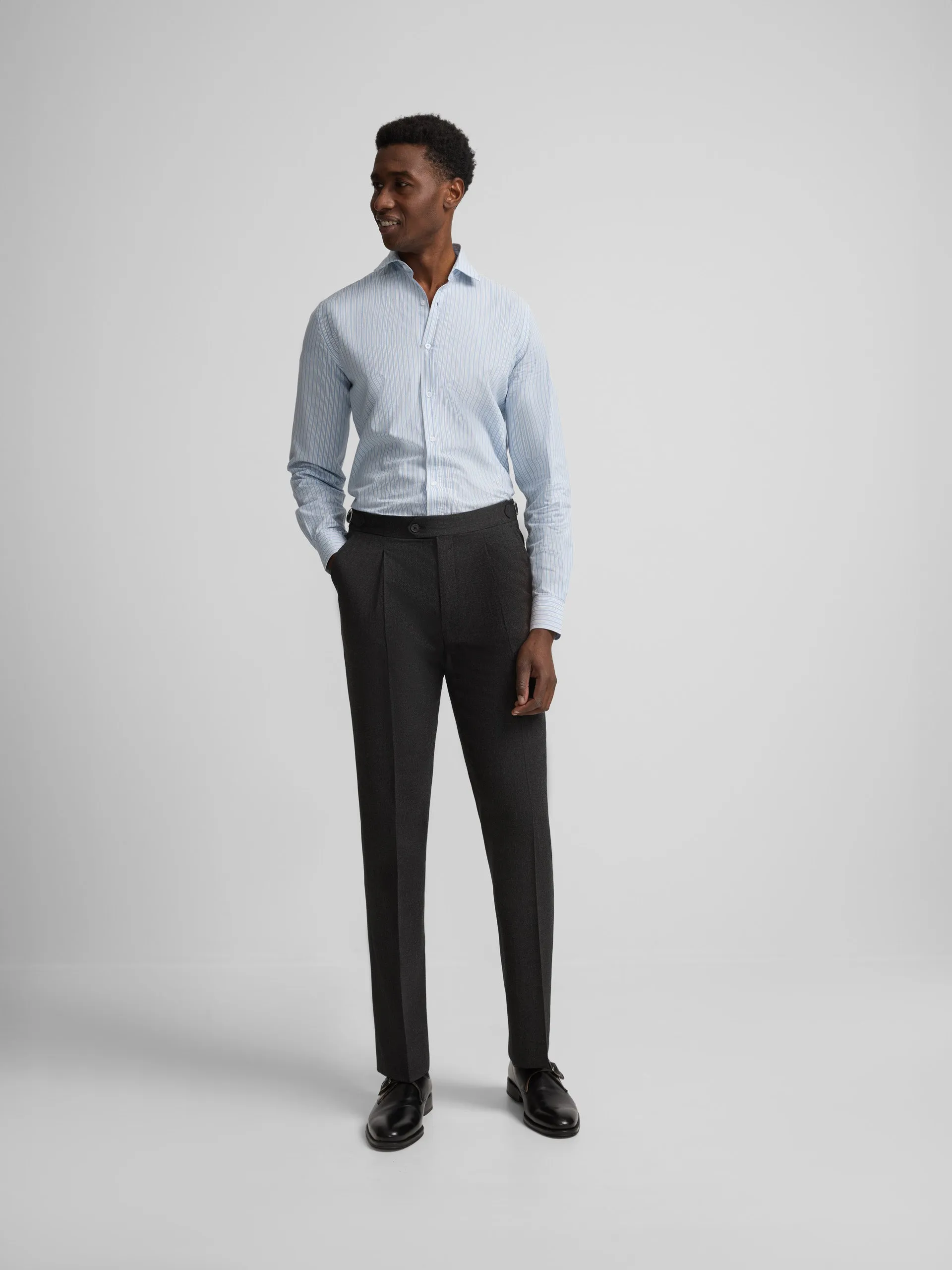 Dark grey pleated dress trousers sold by Silbon