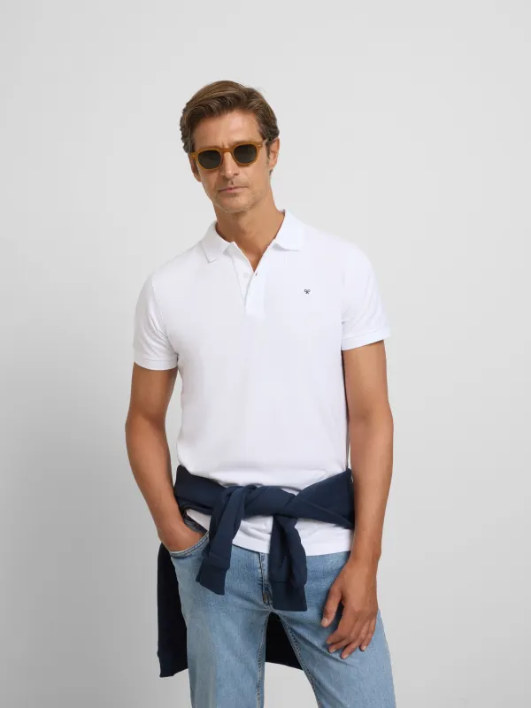 Classic plain white polo shirt sold by Silbon