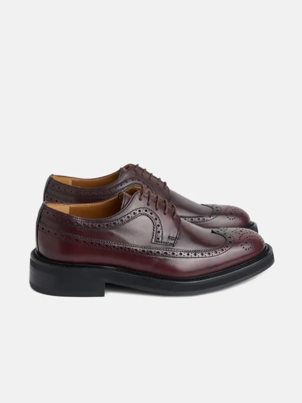 Classic burgundy perforated leather shoe sold by Silbon