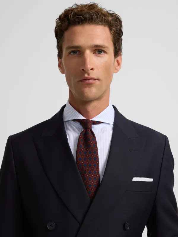 Navy blue stretch double-breasted suit jacket sold by Silbon