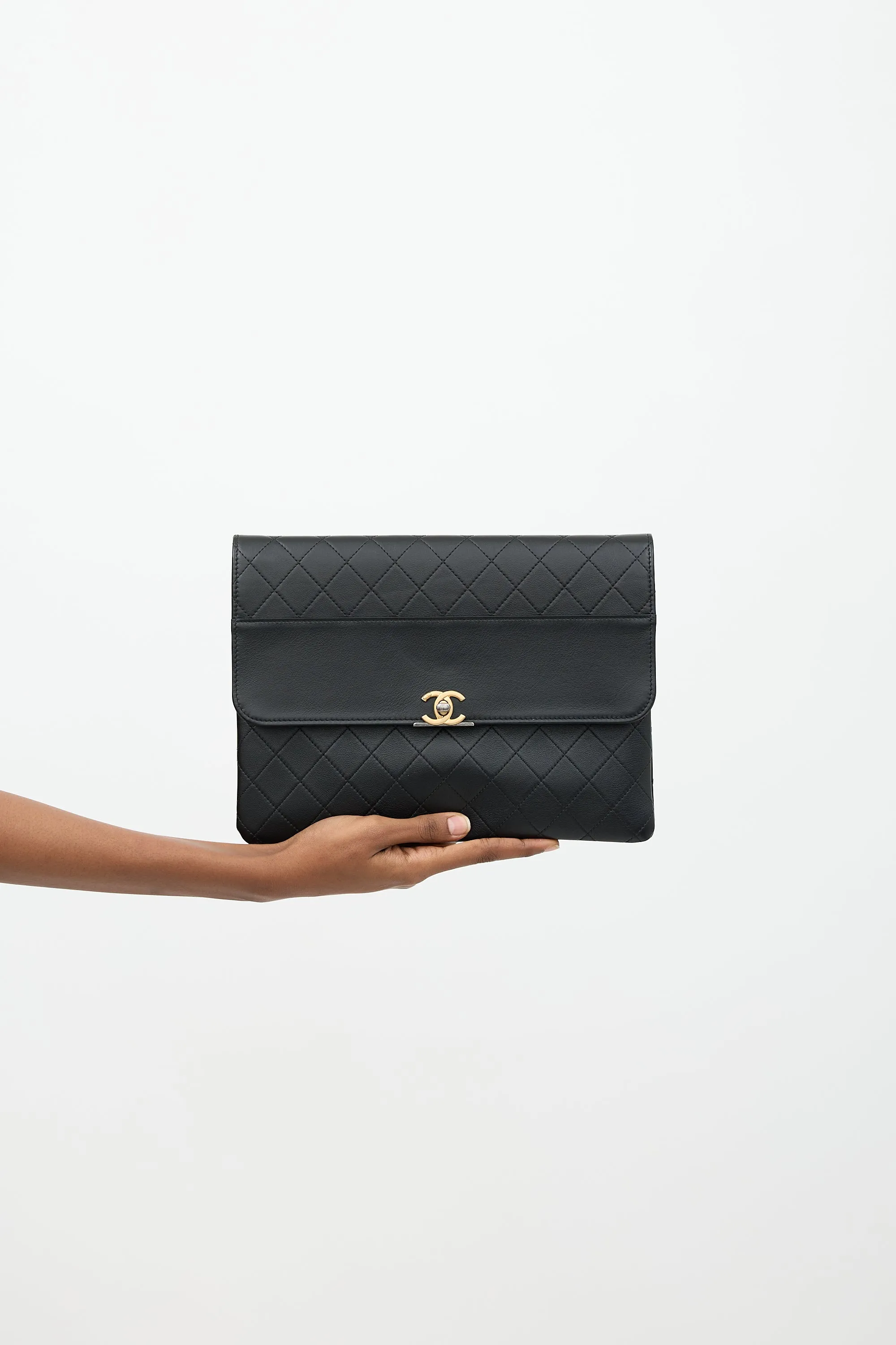 Leather Sleek and Chic Clutch sold by VSP Consignment