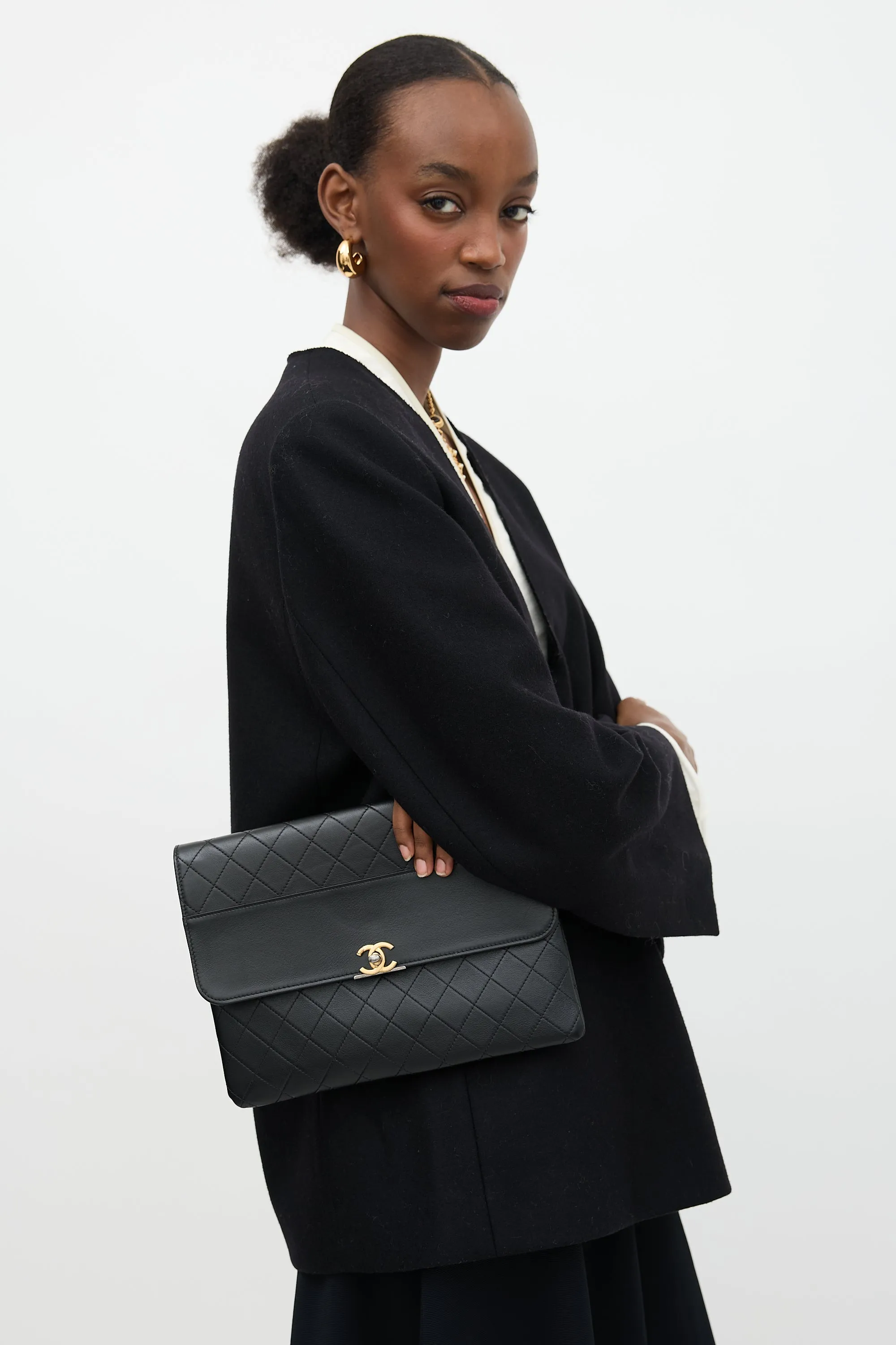 Leather Sleek and Chic Clutch sold by VSP Consignment product image thumbnail 5