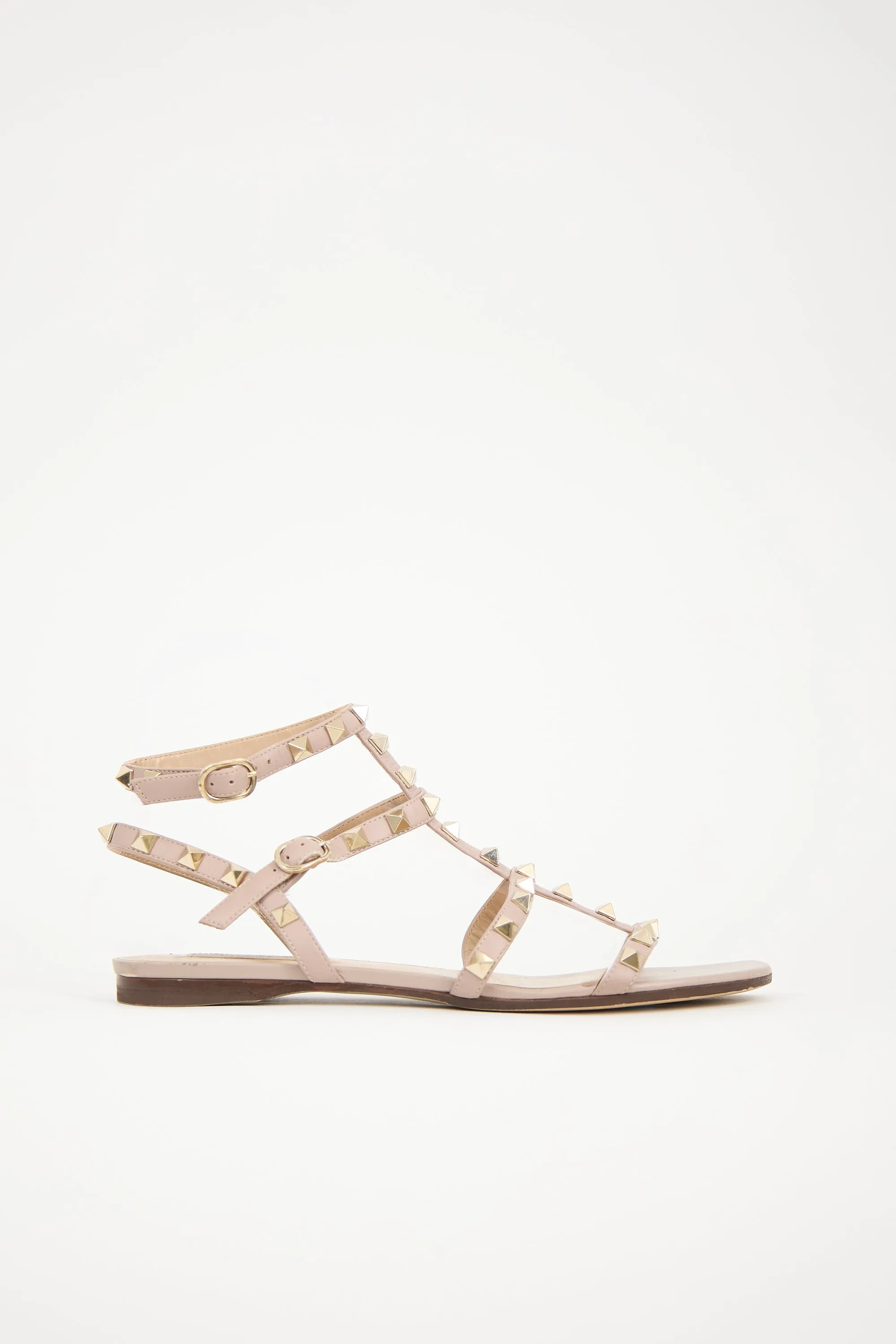 Leather Rockstud Caged Sandal sold by VSP Consignment