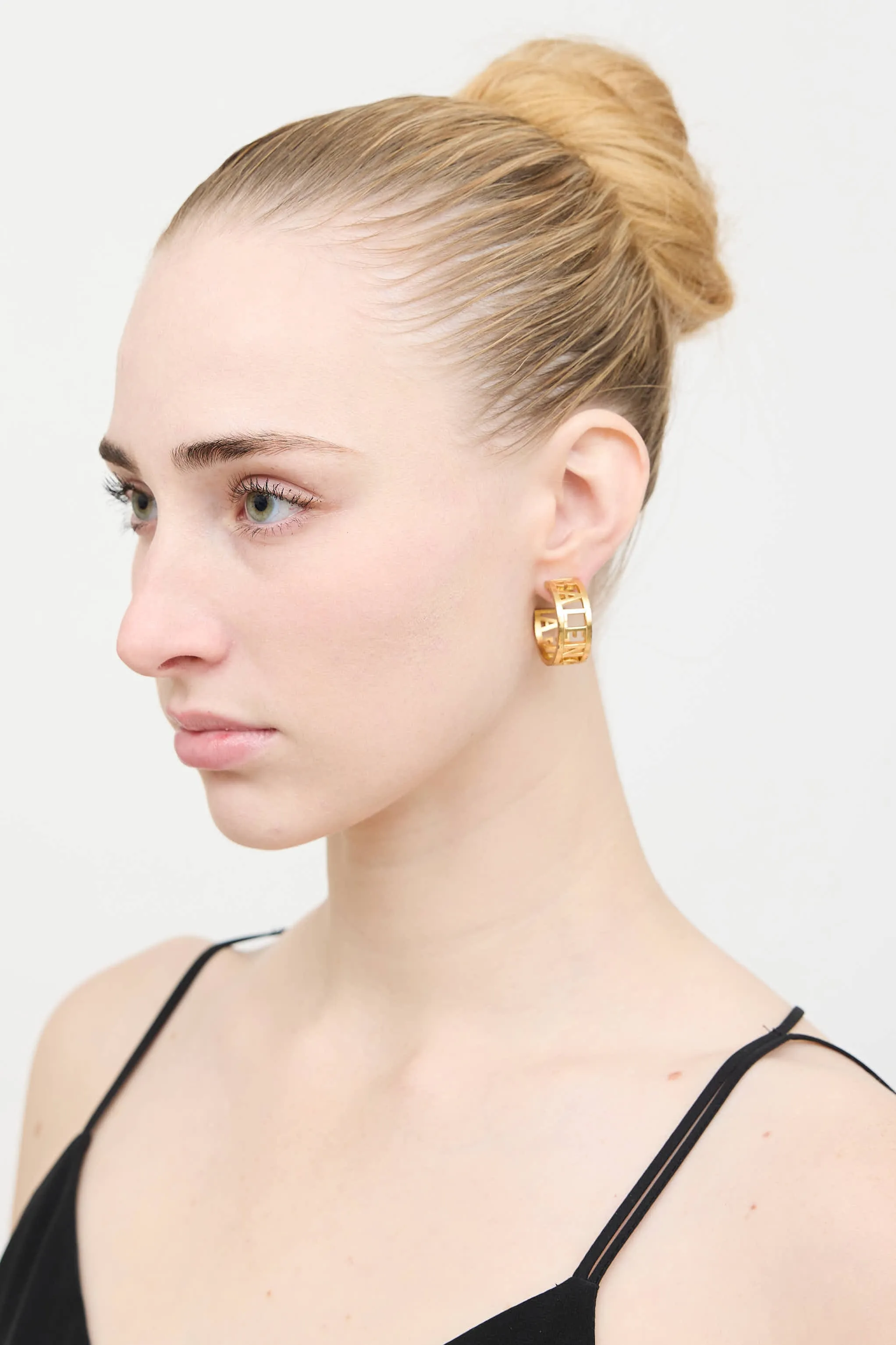 Gold Logo Hoop Earring sold by VSP Consignment product image thumbnail 2