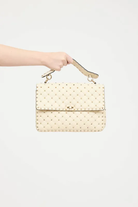 Leather Rockstud Spike Bag sold by VSP Consignment