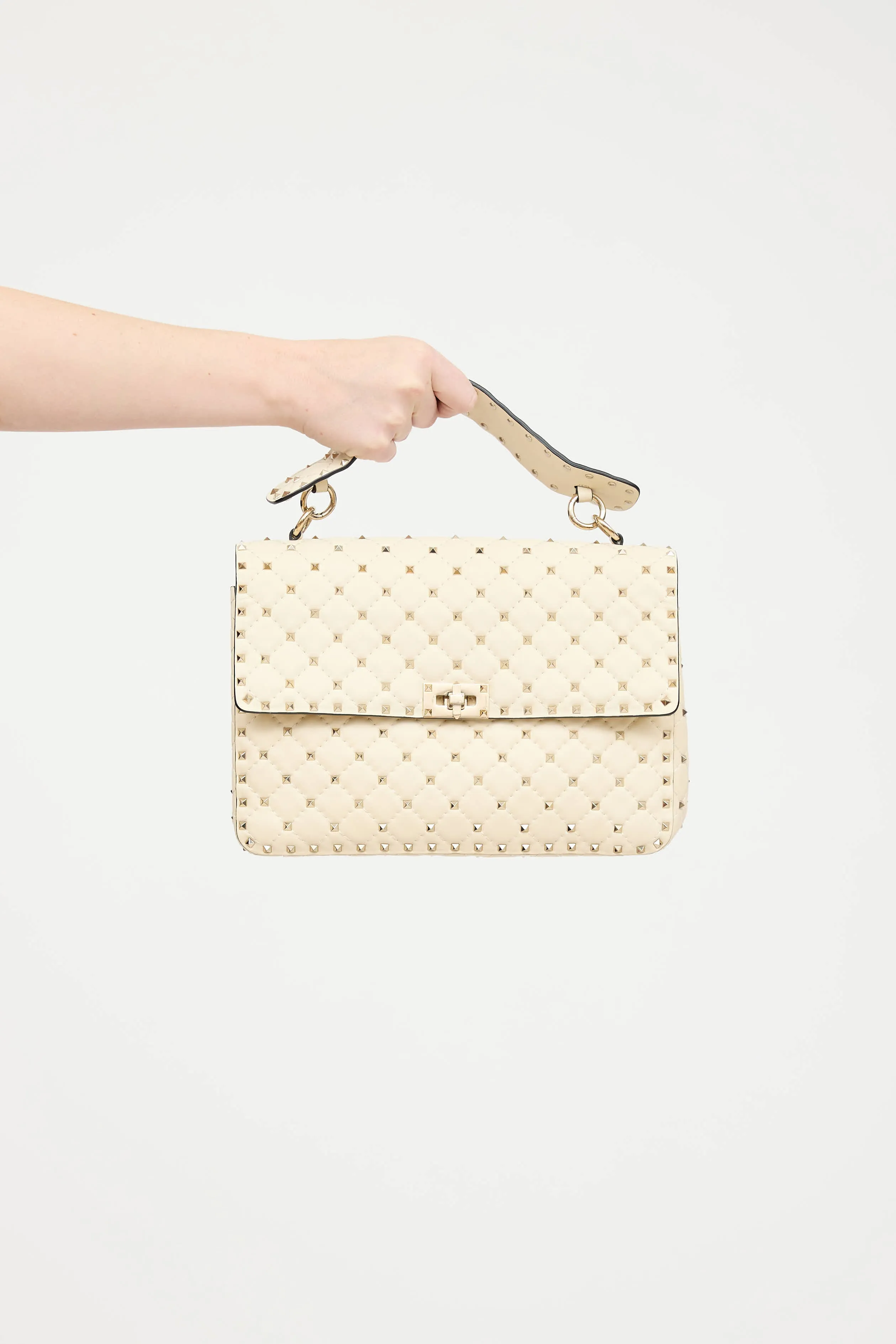 Leather Rockstud Spike Bag sold by VSP Consignment