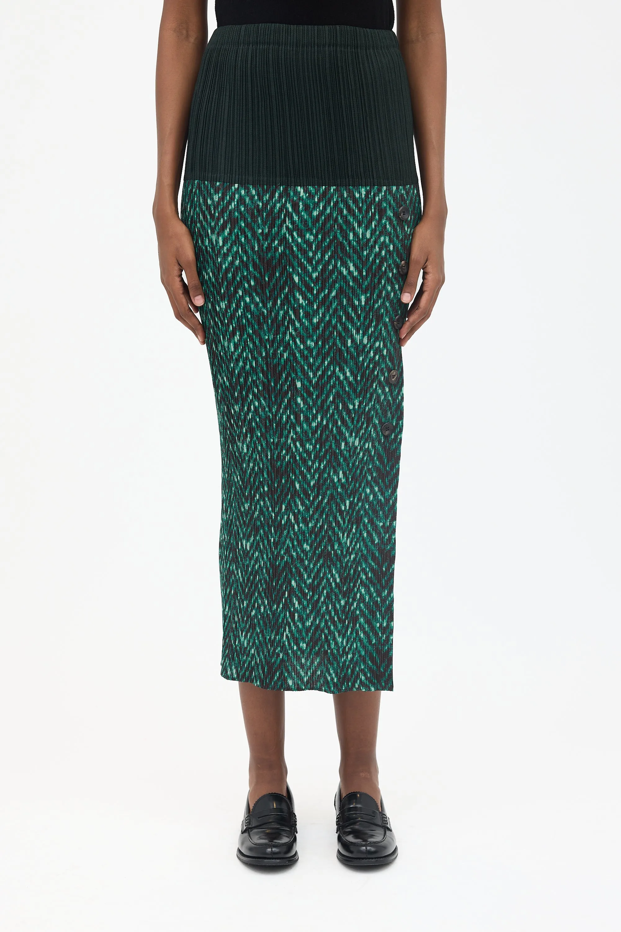 Pleated Side Button Skirt sold by VSP Consignment