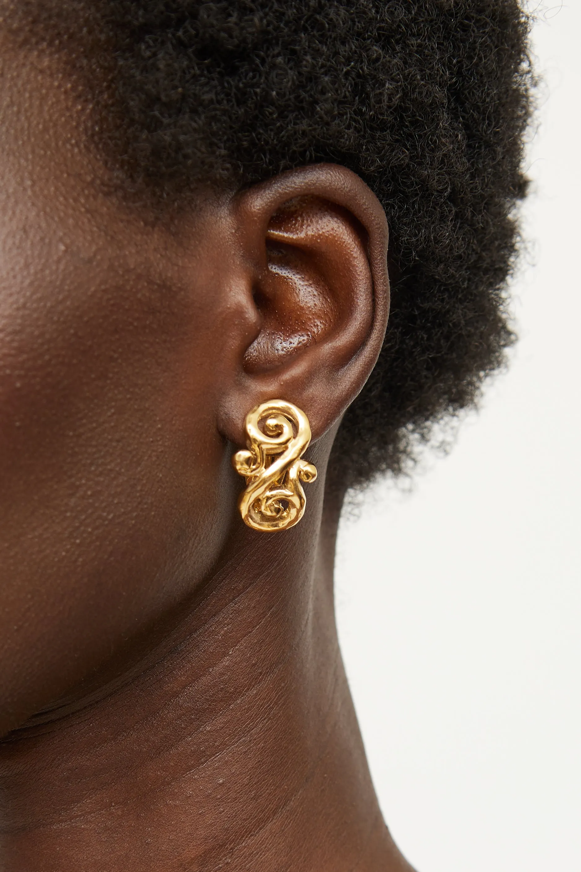 Gold Clip On Earrings sold by VSP Consignment