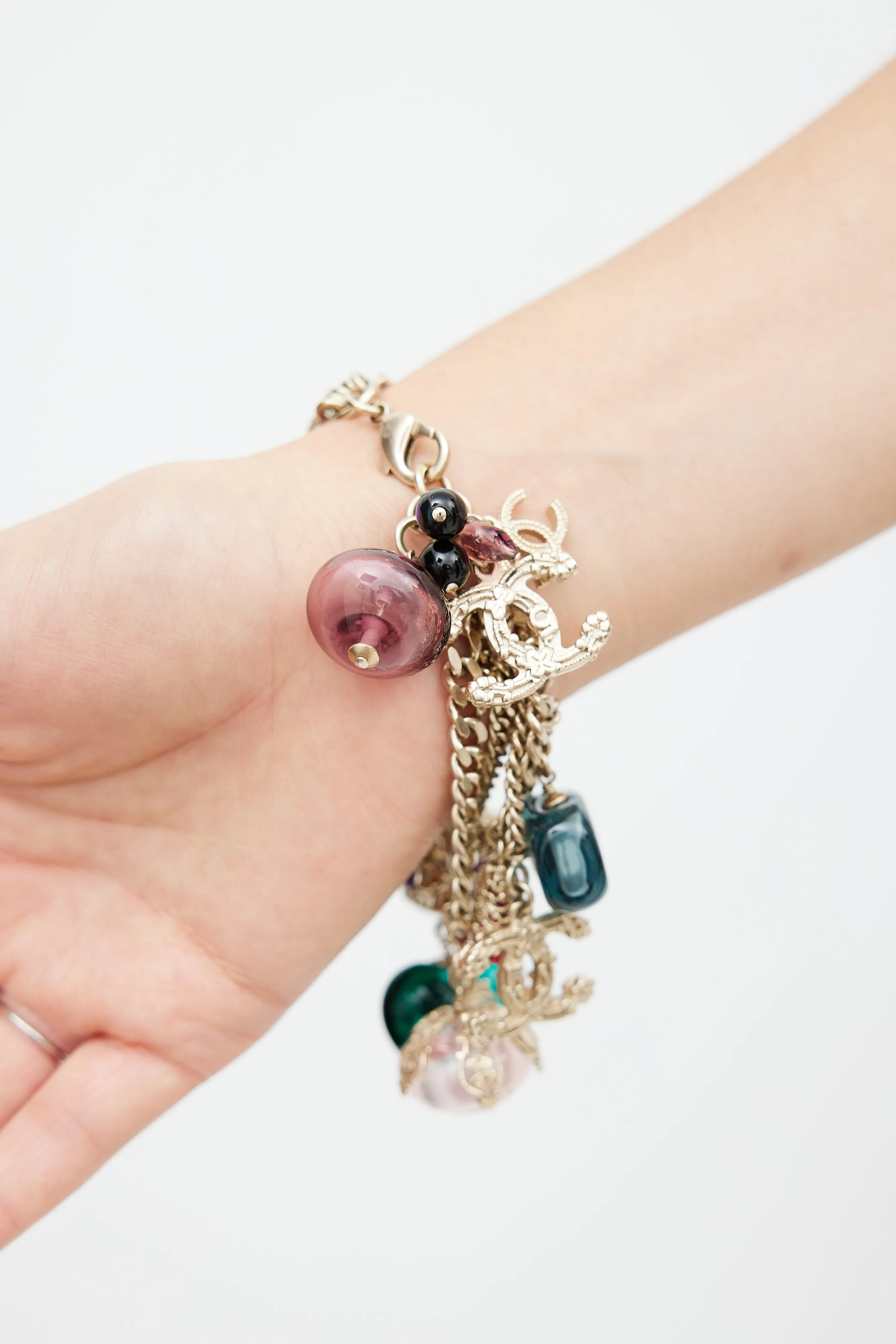 Gold Multi Chainlink Charm Bracelet sold by VSP Consignment product image thumbnail 3