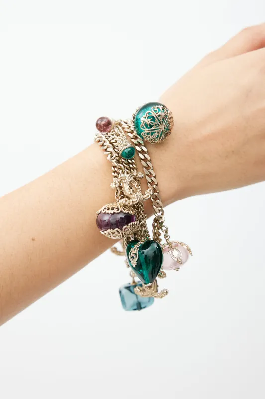 Gold Multi Chainlink Charm Bracelet sold by VSP Consignment