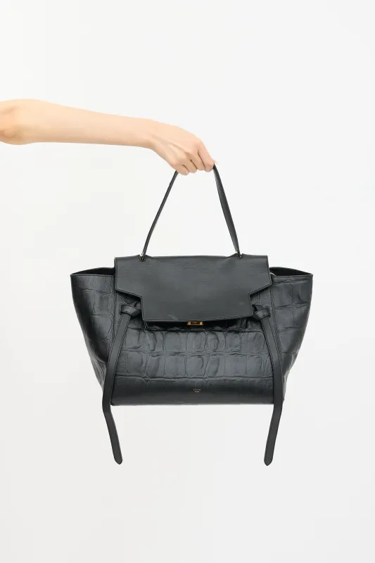 2015 Embossed Leather Belt Bag sold by VSP Consignment