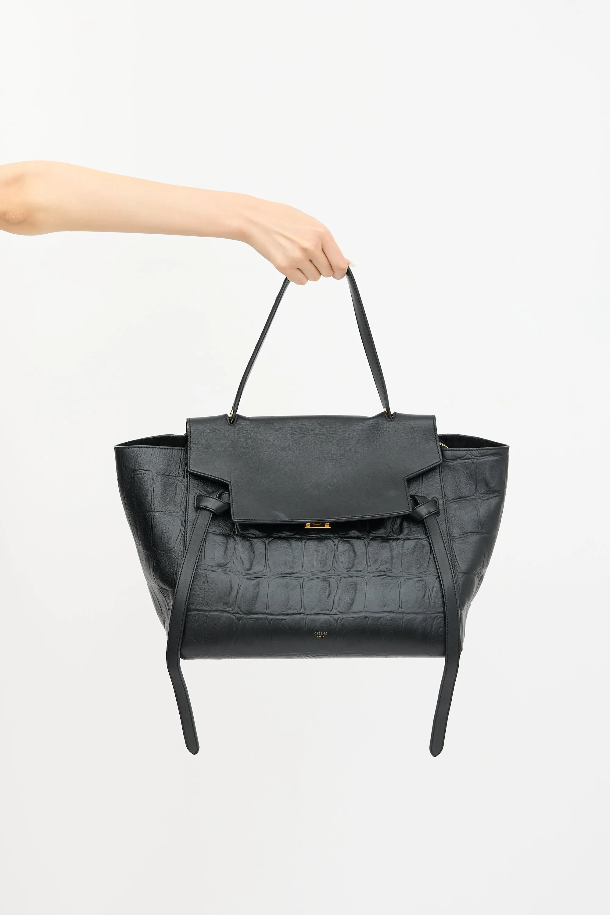 2015 Embossed Leather Belt Bag sold by VSP Consignment