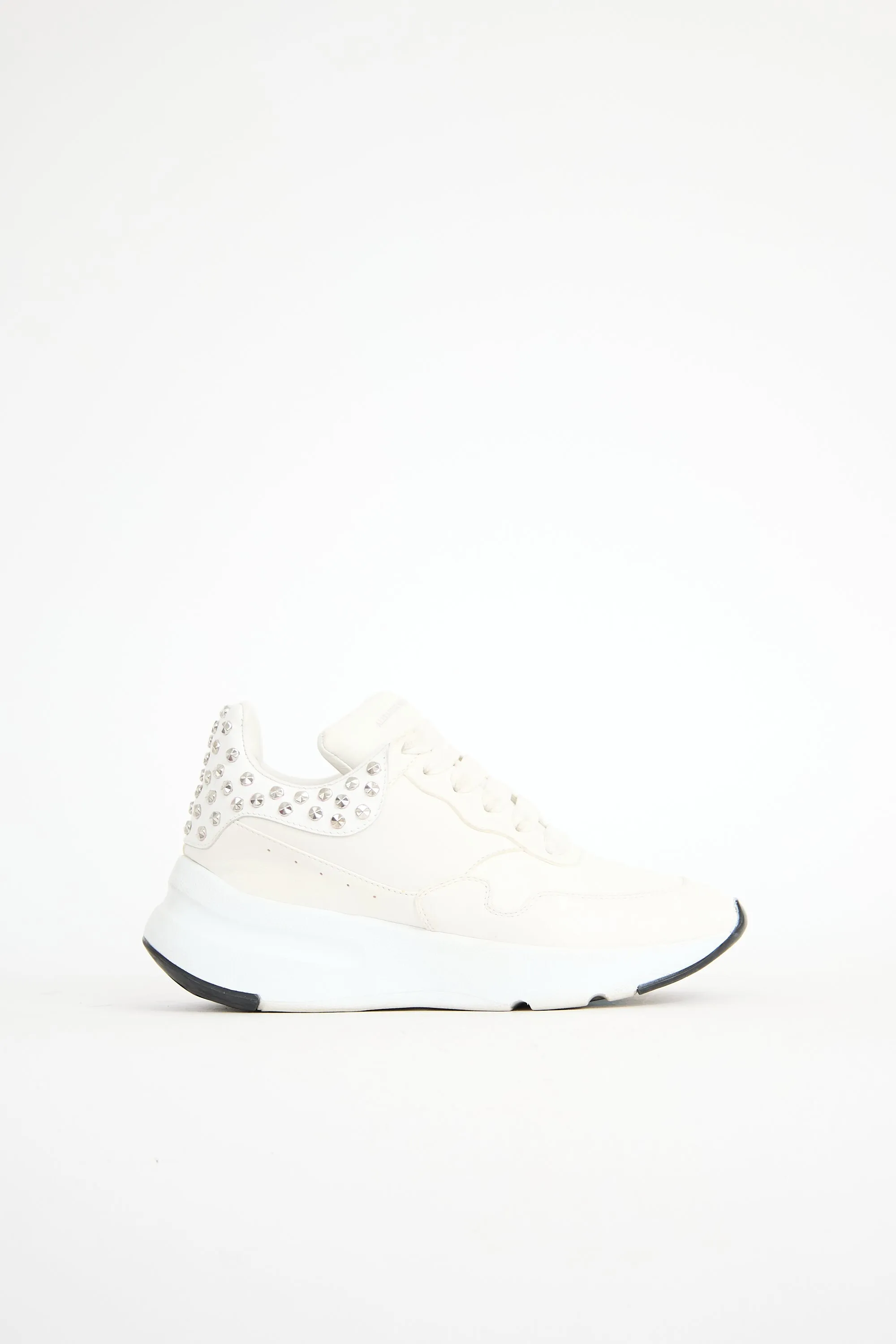 Studded Oversized Runner Sneaker sold by VSP Consignment