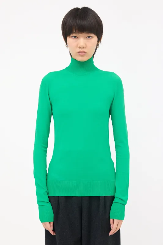 Stretch Turtleneck Top sold by VSP Consignment