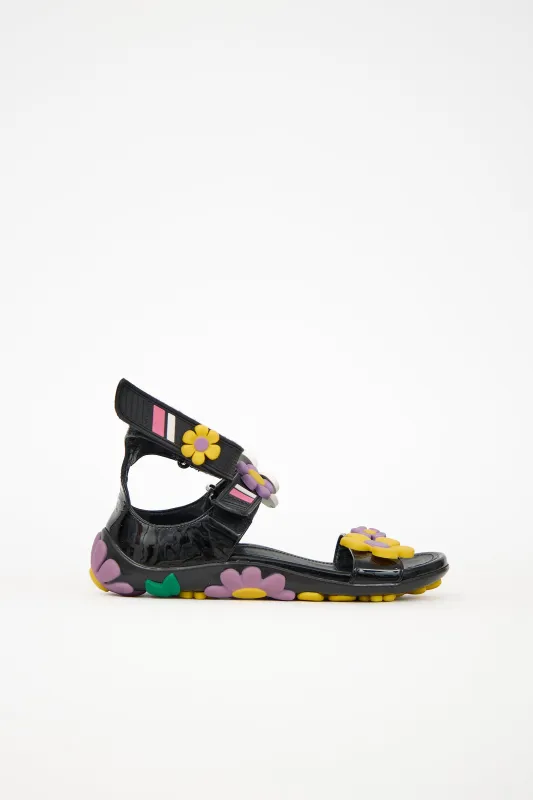 Patent & Rubber Flower Sandal sold by VSP Consignment
