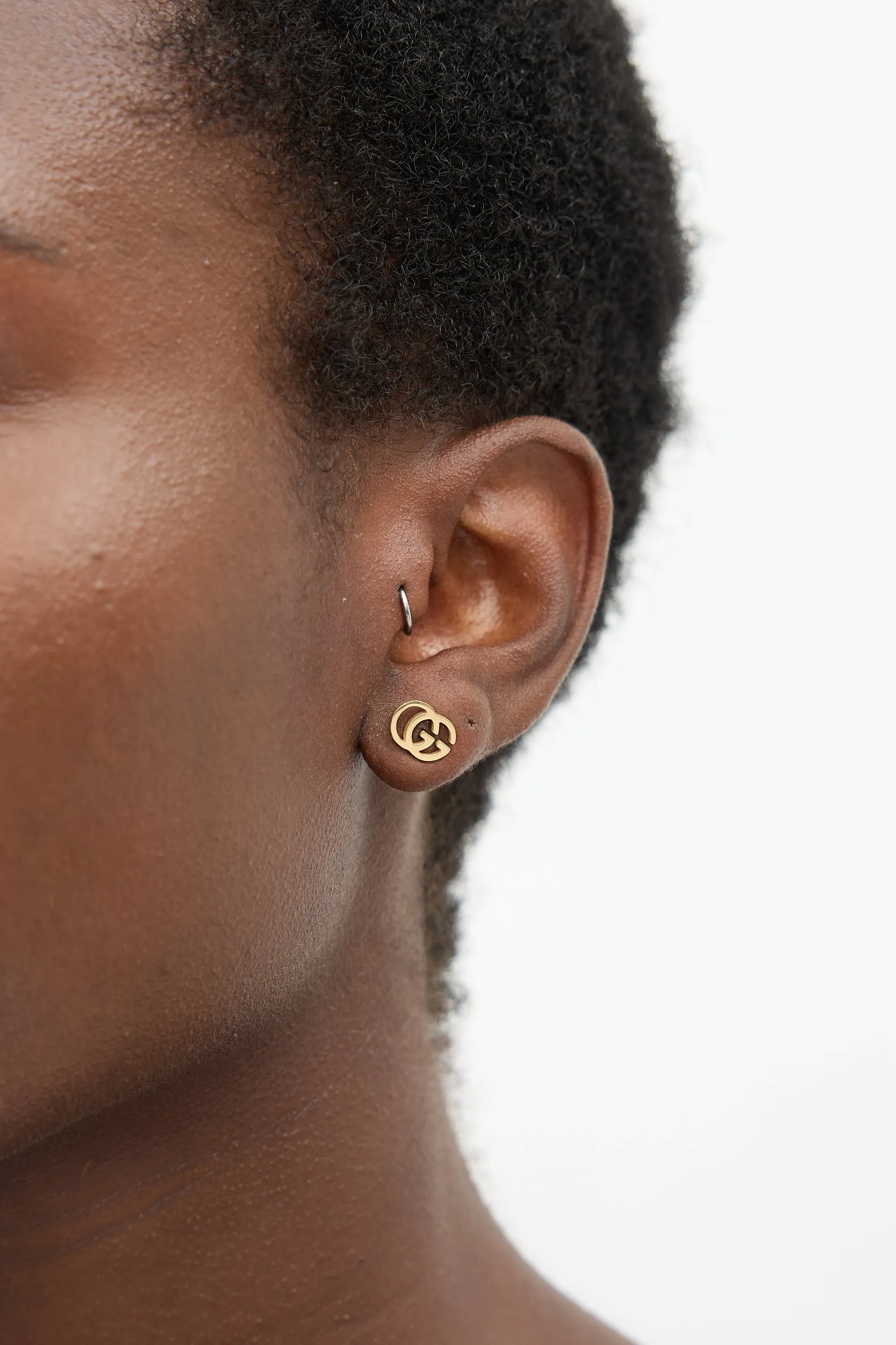 18K Gold GG Stud Earrings sold by VSP Consignment