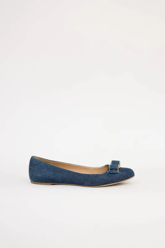 Denim Vara Bow Flat sold by VSP Consignment