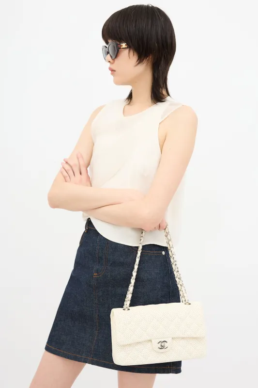 Perforated Leather East West Bag made by Chanel