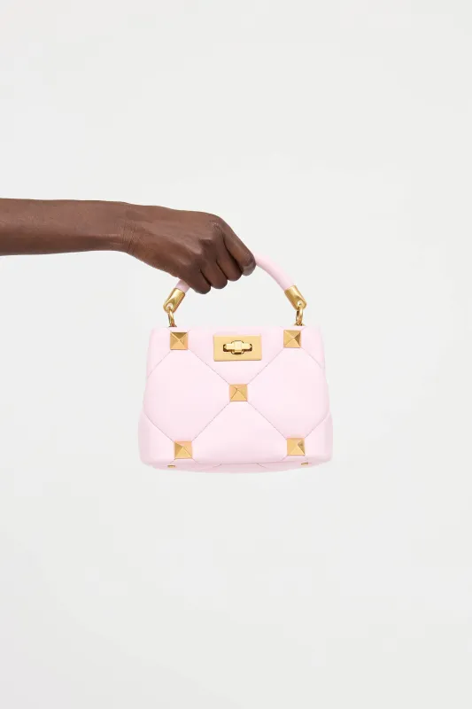 Roman Stud Handle Bag sold by VSP Consignment