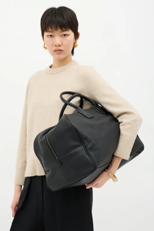 Pebbled Leather Duffle Bag made by Yves Saint Laurent