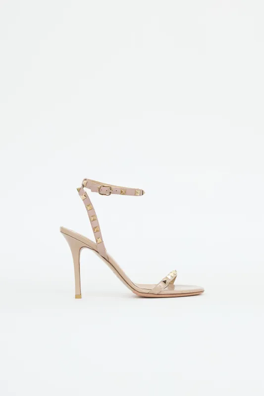 Patent Rockstud Sandal sold by VSP Consignment