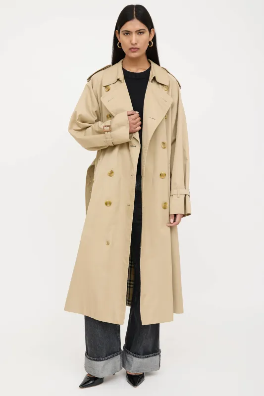 Double Breasted Belted Trench Coat sold by VSP Consignment