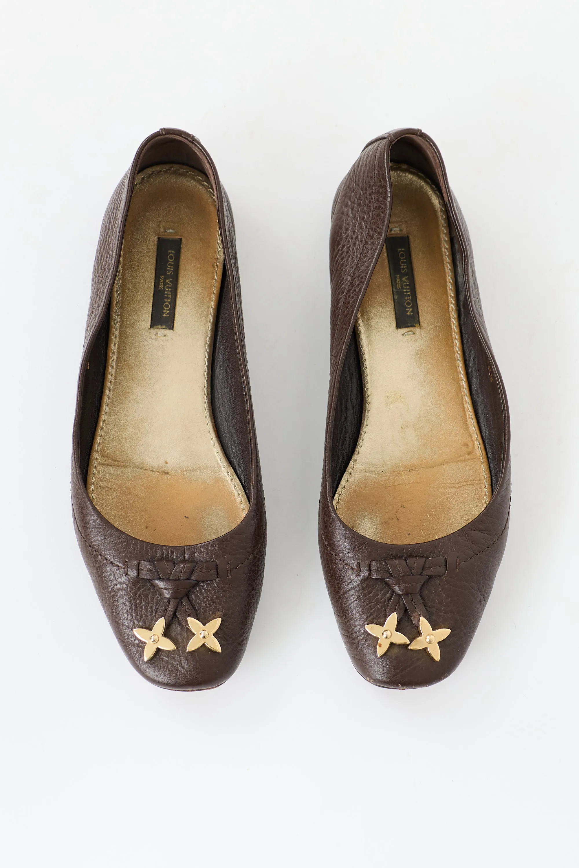 Leather Monogram Flower Flat sold by VSP Consignment