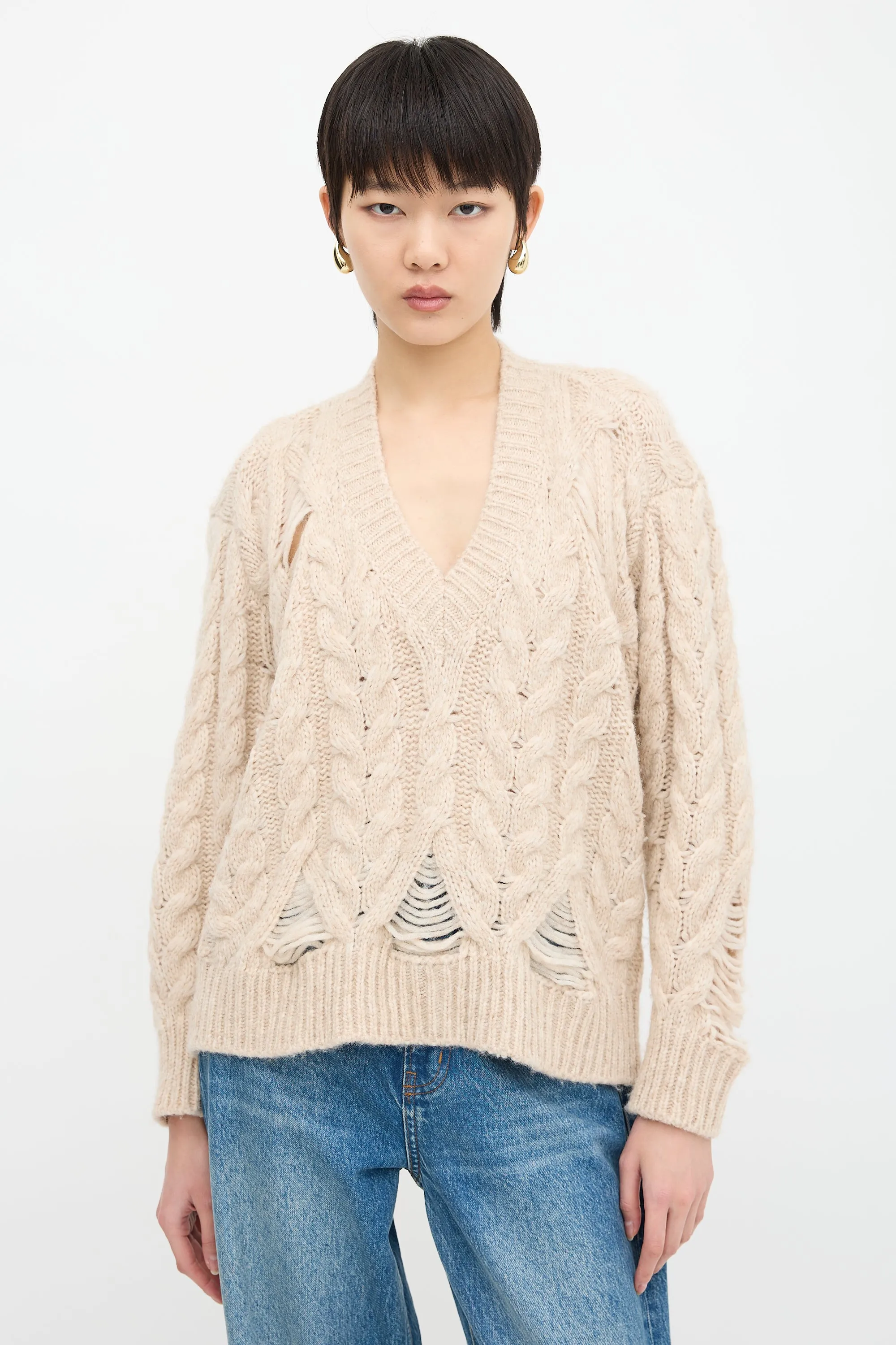 Wool Ladder Stitch Sweater sold by VSP Consignment