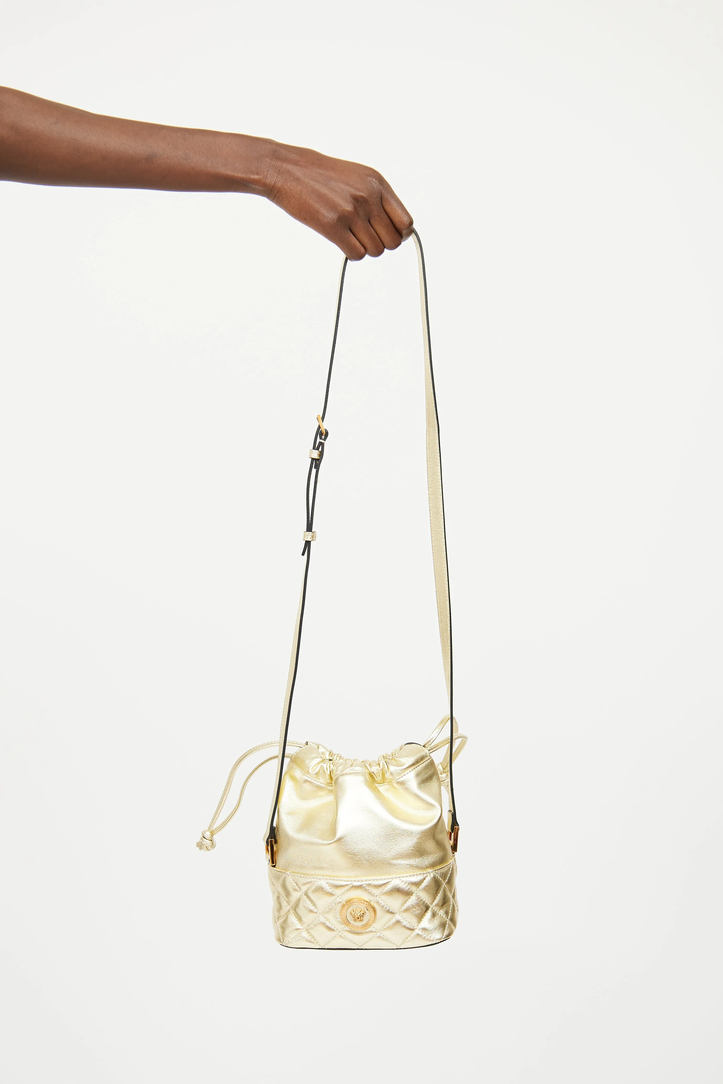 Medusa Drawstring Bucket Bag sold by VSP Consignment