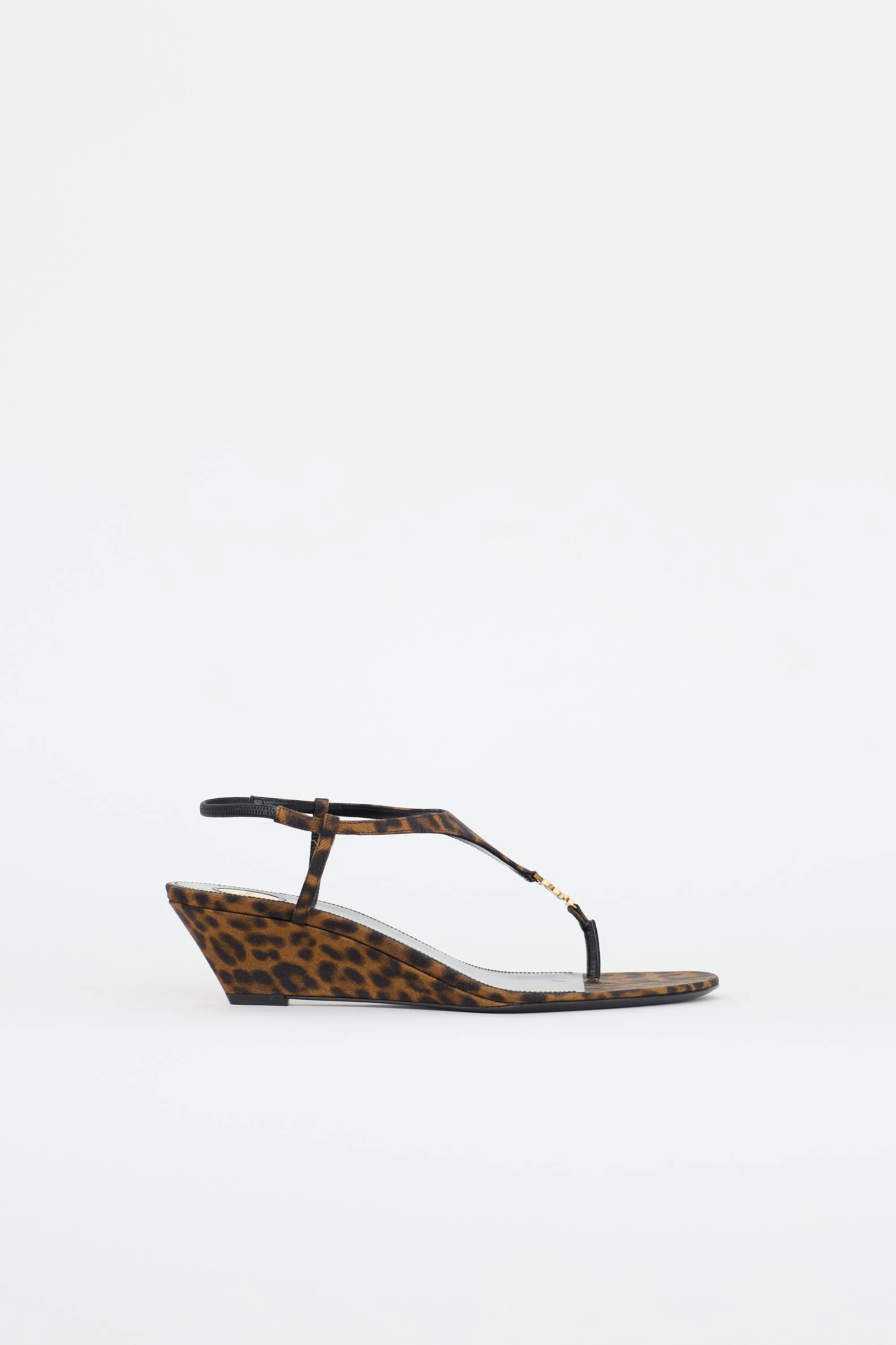 Printed Cassandre Wedge Sandal sold by VSP Consignment