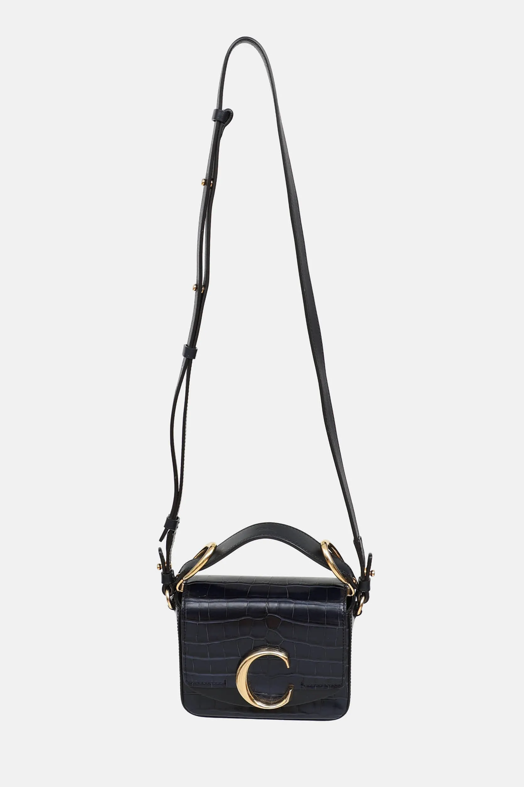 Embossed Leather Mini C Bag sold by VSP Consignment