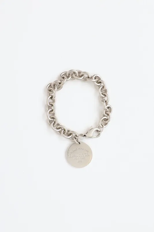 Sterling Silver Circle Return Tag Bracelet made by Tiffany & Co.
