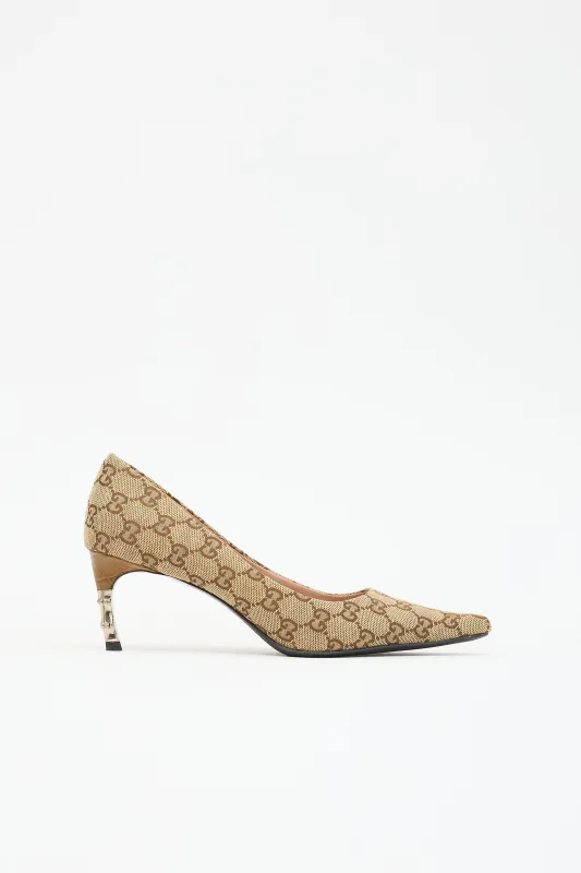 C. 2003 GG Monogram Pump made by Gucci