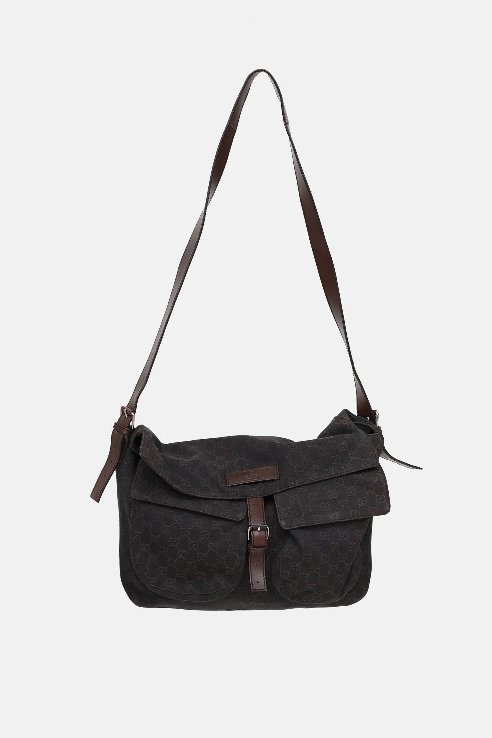C. 2000s Denim Monogram Messenger Bag sold by VSP Consignment