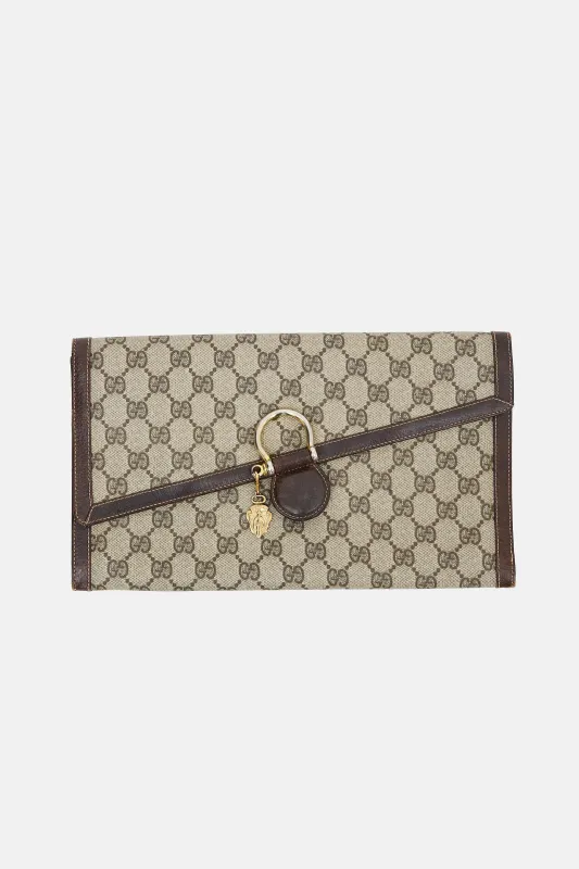 GG Supreme Clutch made by Gucci