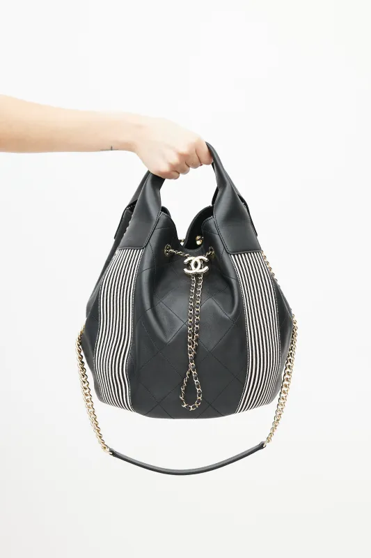 2019 Black & White Stitched Drawstring Leather Bag made by Chanel