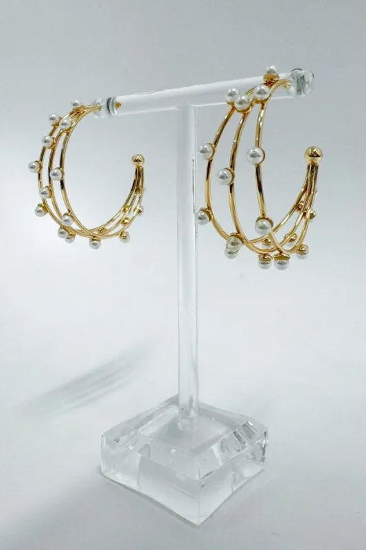 Captivating Class Triple Row Pearl Hoop Earrings sold by Madison + Mallory