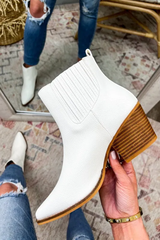 Karrington Snake Print Heeled Booties sold by Madison + Mallory