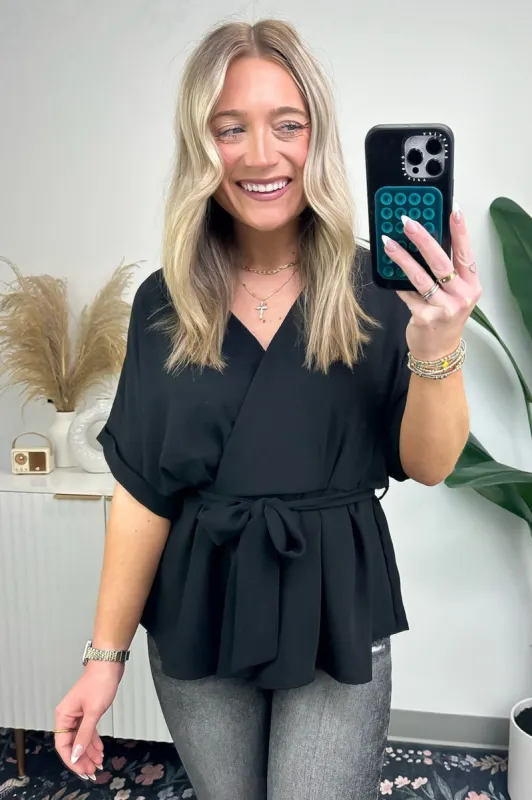 Alluring Marvel Surplice Tie Front Top sold by Madison + Mallory