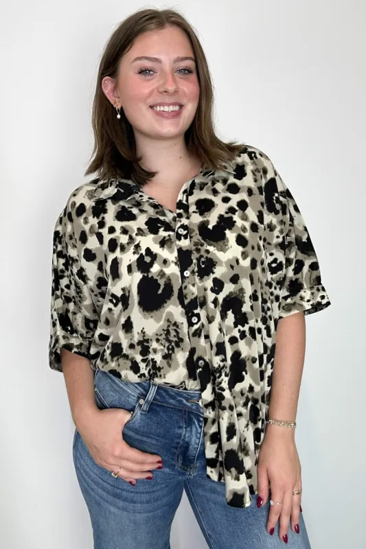 Wild Ease Oversized Animal Print Dolman Button Down Top sold by Madison + Mallory