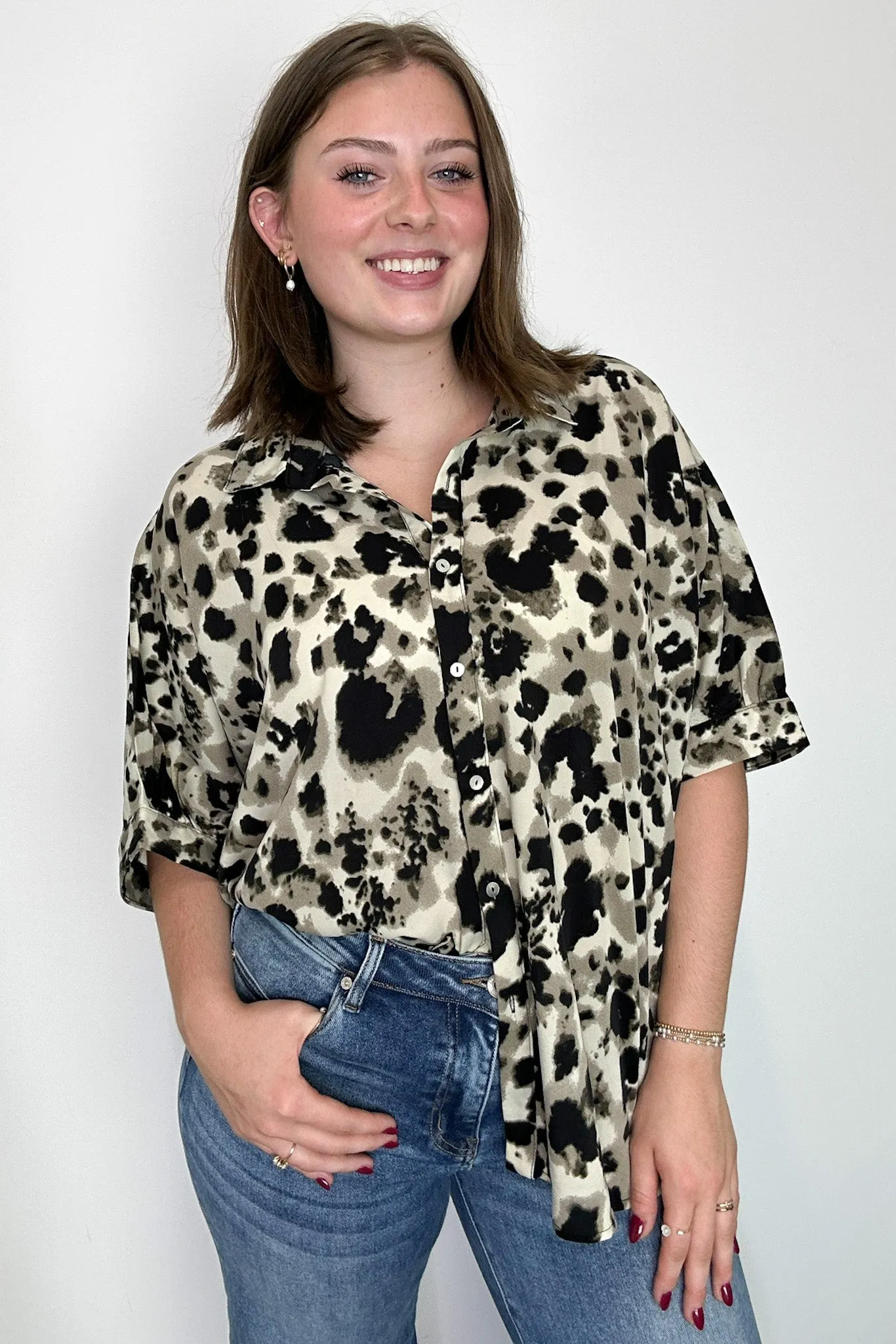 Wild Ease Oversized Animal Print Dolman Button Down Top sold by Madison + Mallory
