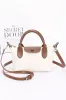 Delightful Design Embossed Faux Leather Crossbody Bag sold by Madison + Mallory