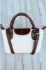 Delightful Design Embossed Faux Leather Crossbody Bag sold by Madison + Mallory