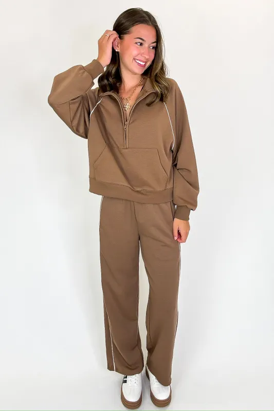 Trackline Half Zip Up Piping Detail Knit Top sold by Madison + Mallory