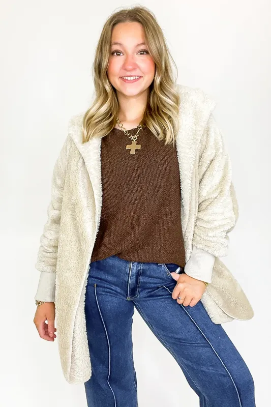 Cozy Crest Hooded Faux Fur Jacket sold by Madison + Mallory