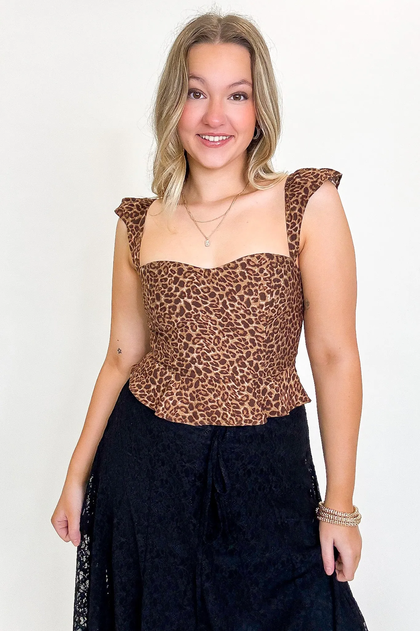 Wild Frill Animal Print Ruffle Hem Top sold by Madison + Mallory product image thumbnail 5