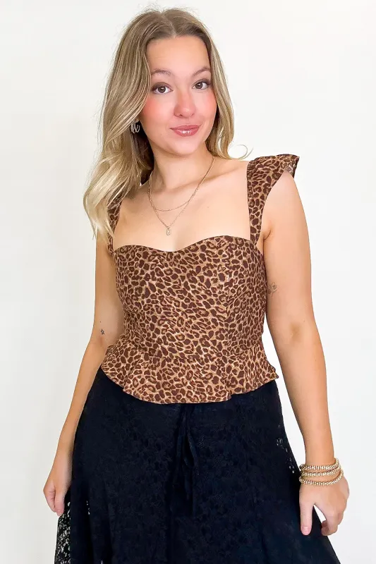 Wild Frill Animal Print Ruffle Hem Top sold by Madison + Mallory