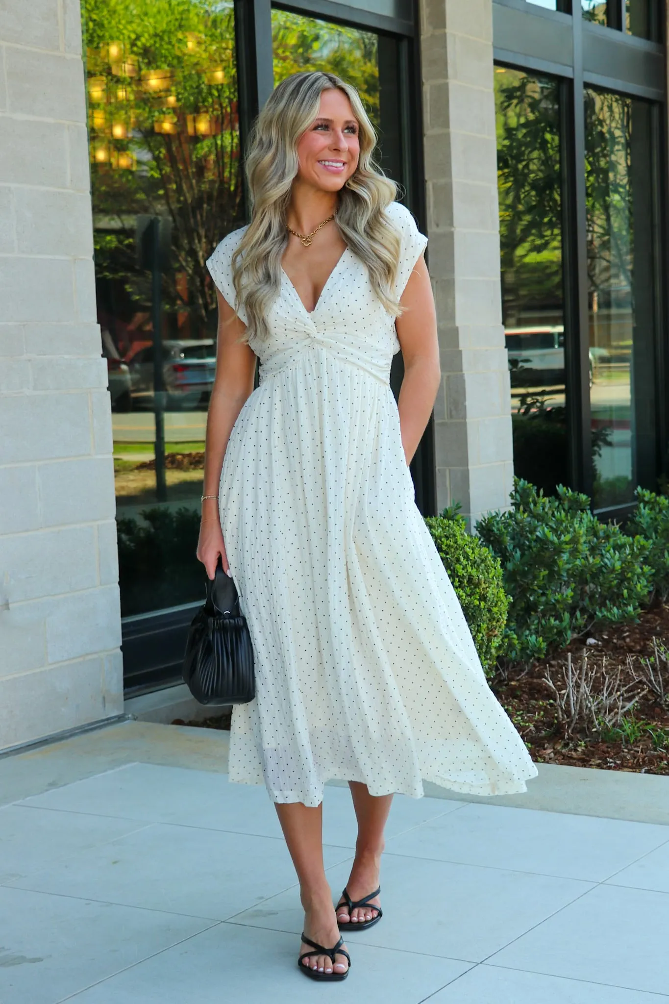 Timeless Twist Polka Dot V-Neck Midi Dress sold by Madison + Mallory