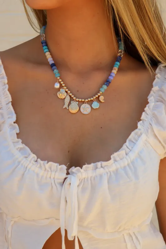 The Coastal Tide Beaded Charm Necklace made by Wall to Wall